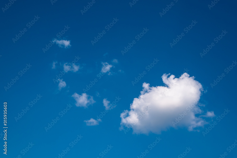 Blue Sky and Clouds. Daylight, mood. View, White clouds in the beautiful blue sky, Clouds in the blue sky. Oxygen, environment. Blue Sky and Clouds. Daylight, mood. View, White clouds in the beautiful blue sky, Clouds in the blue sky. Oxygen, environment.
