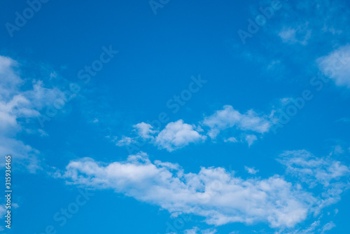 Blue Sky and Clouds. Daylight  mood. View  White clouds in the beautiful blue sky  Clouds in the blue sky. Oxygen  environment.