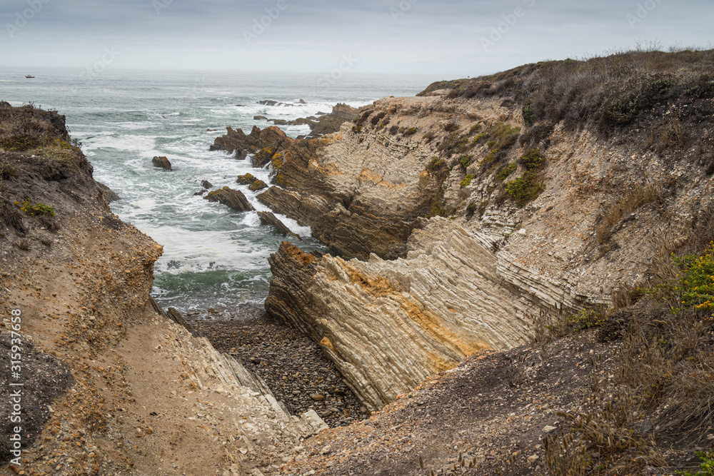 Waves crashing on rocks at Montana de Oro, California