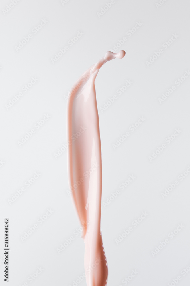 fresh pink milk splash isolated on white fresh pink milk splash isolated on white