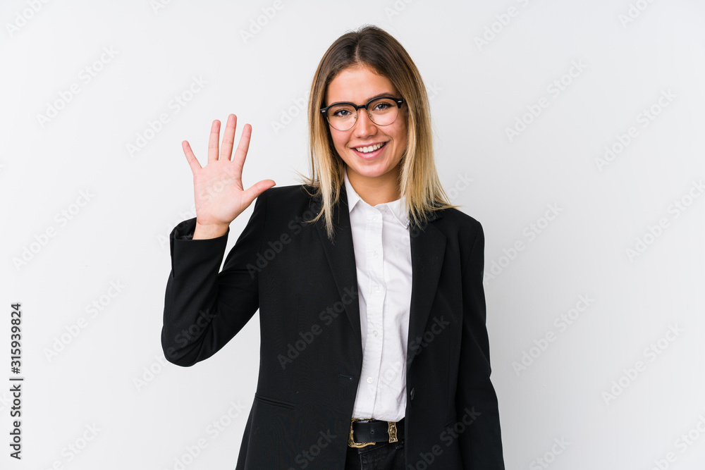 Young business caucasian woman smiling cheerful showing number five with fingers. Young business caucasian woman smiling cheerful showing number five with fingers.