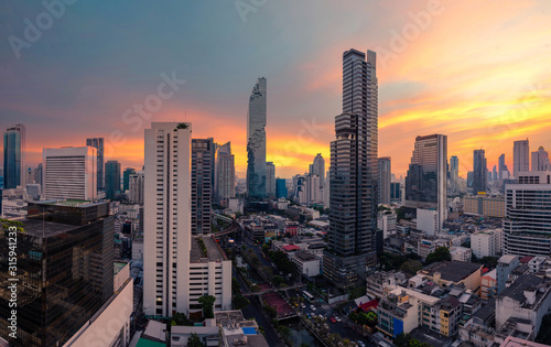 sunset rooftop view skyline bangkok twilight  office buildings  living  condominium in bangkok city  skyline top view Downtown and business office bank financial in capital city of thailand asian 