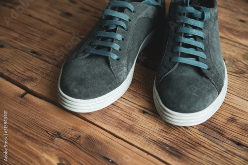 man sport shoes on the wooden background