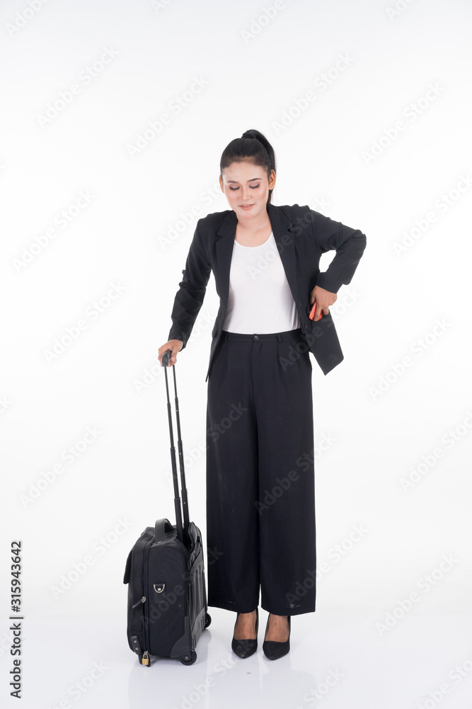 Businesswoman on a business trip, with luggage isolated on white background. Suitable for cut out, manipulation or composite works for travel or business concept.