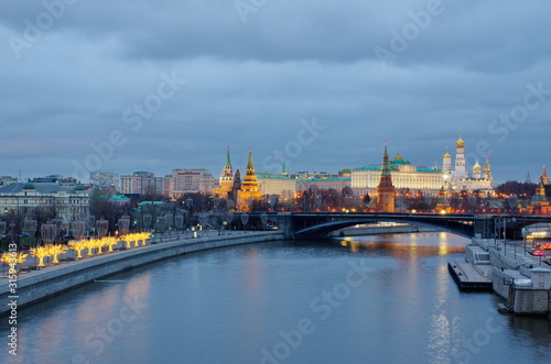 Evening view of the Prechistenskaya embankment, the Moscow Kremlin and the Big Stone bridge. Moscow, Russia