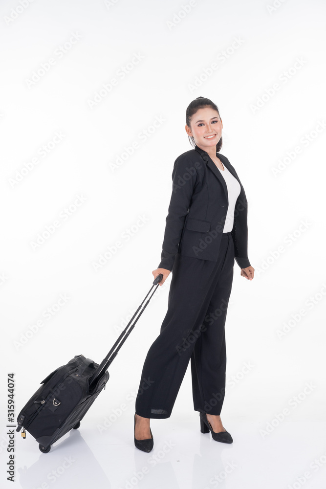 Businesswoman on a business trip, with luggage isolated on white background. Suitable for cut out, manipulation or composite works for travel or business concept. Businesswoman on a business trip, with luggage isolated on white background. Suitable for cut out, manipulation or composite works for travel or business concept.