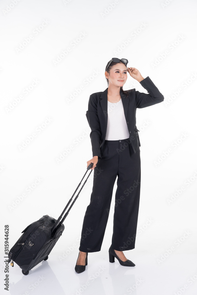 Businesswoman on a business trip, with luggage isolated on white background. Suitable for cut out, manipulation or composite works for travel or business concept. Businesswoman on a business trip, with luggage isolated on white background. Suitable for cut out, manipulation or composite works for travel or business concept.