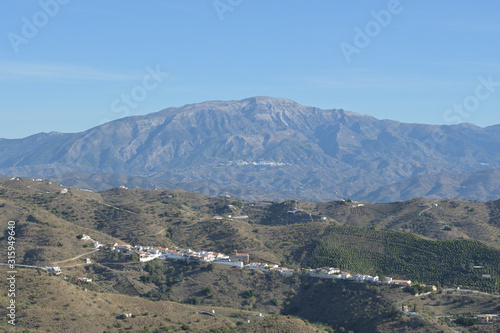 Landscape of Benaque and mountains a sunny day photo