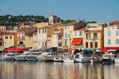 Colorful buildings and boats in the port of Cassis, France.