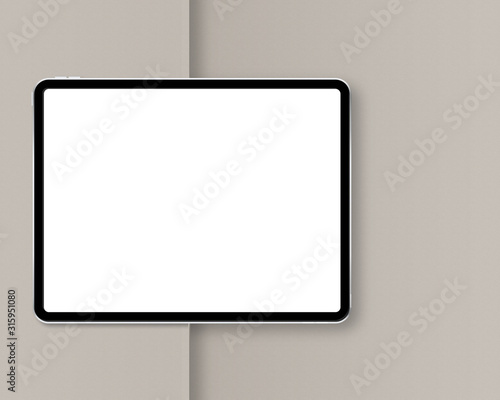 Modern tablet with blank white screen. Horizontal tablet mockup with soft shadow. Top view. Photo mockup with clipping path.
