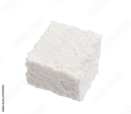 Ricotta cheese cube isolate on white. Macro focus stacking, clipping path.