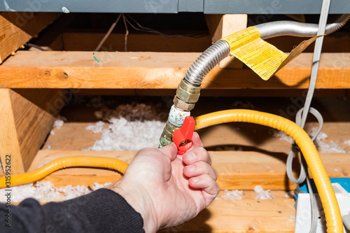 Принти на полотні Hand turning safety shut off valve of a natural gas pipe