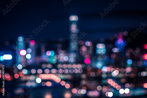 Bokeh lights of city skyline at night, modern city blur