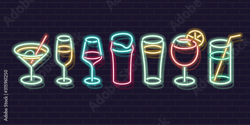 Neon cocktails set. Fluorescent isolated vector icons of brick wall background for menu, banner, advertisement. Isolated glowing classic drinks for any dark background.