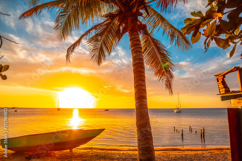 Sunset landscape of West End Beach, Roatan Island. Honduras photo