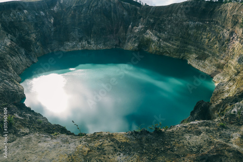 Kelimutu - Close up on turquoise colored volcanic lake © Chris