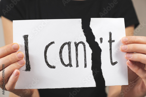 Obraz na płótnie Hands tearing out negation of the i can not sign