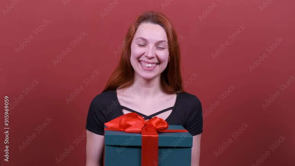Celebrating party day, woman hold present box. People sincere emotions, lifestyle concept. Celebrating party day, woman hold present box. People sincere emotions, lifestyle concept.