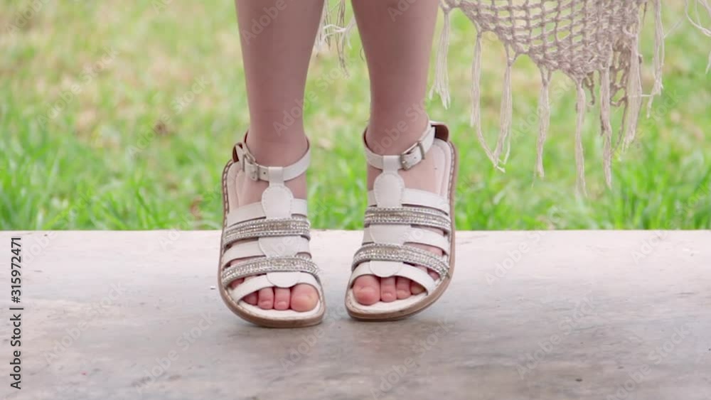 feet of a girl with shoes feet of a girl with shoes
