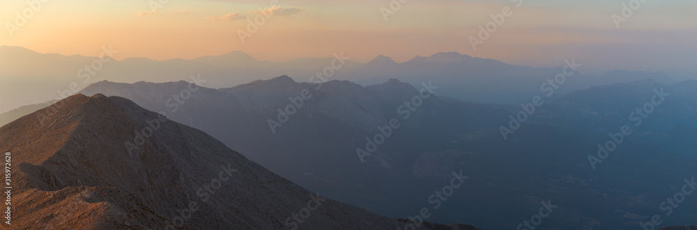 Big panorama of the mountains at sunset, twilight