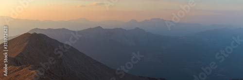 Big panorama of the mountains at sunset, twilight