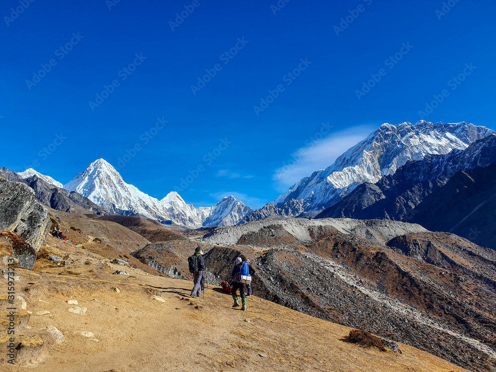 Fototapeta premium Beautiful view on Pumori mountain in the early sunny morning. Everest base camp trek: from Dzongla to Lobuche, Solokhumbu, Nepal.