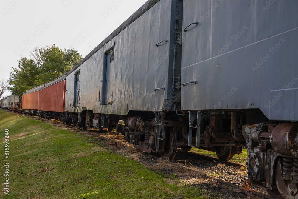 Row of old rusted railroad train cars Row of old rusted railroad train cars