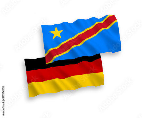 National vector fabric wave flags of Germany and Democratic Republic of the Congo isolated on white background. 1 to 2 proportion.