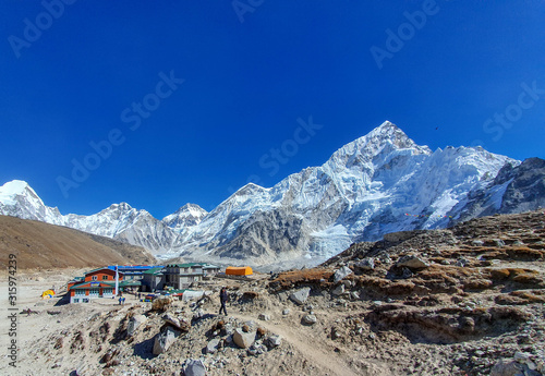 Gorak Shep village and Lhotse mountain on the back side. Everest base camp trek: from Lobuche to Gorak Shep, Nepal, Himalayas.