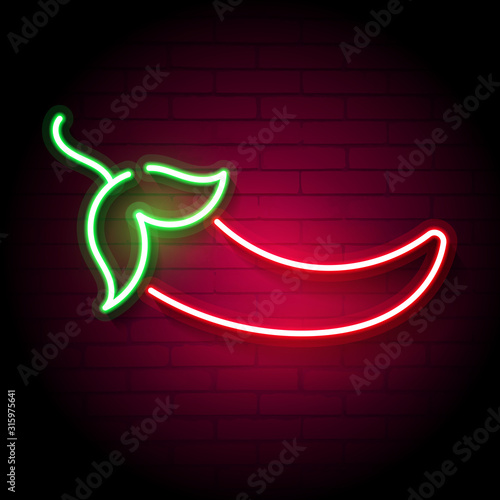 Neon chili pepper on a brick wall