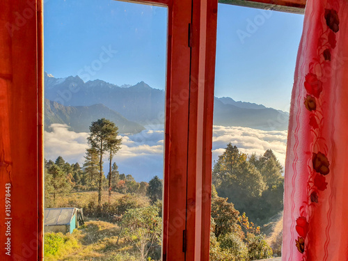 Window view on Taksindu La pass. Taksindu village. Everest base camp trek: way from Kharikhola to Taksindu. Himalayas, Solokhumbu, Nepal. photo