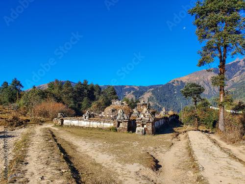 An old stupa. Everest base camp trek: from Taksindu to Salleri. Himalayas, Nepal. photo