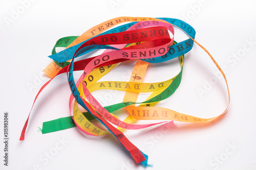 Lucky bracelets typical of Bahia, Brazil (Lembrança do Senhor do Bonfim da Bahia). Translation: Reminder of our Sir of Bonfim of Bahia). photo
