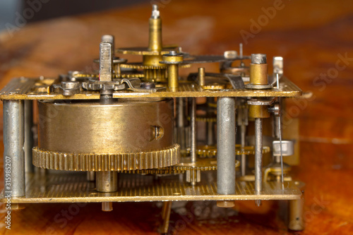 Vintage watch machine macro detail. Close up of old clock.