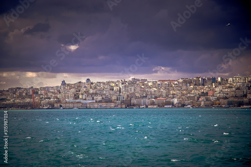 View of Istanbul European sides by the Bosporus under dramatic clouds