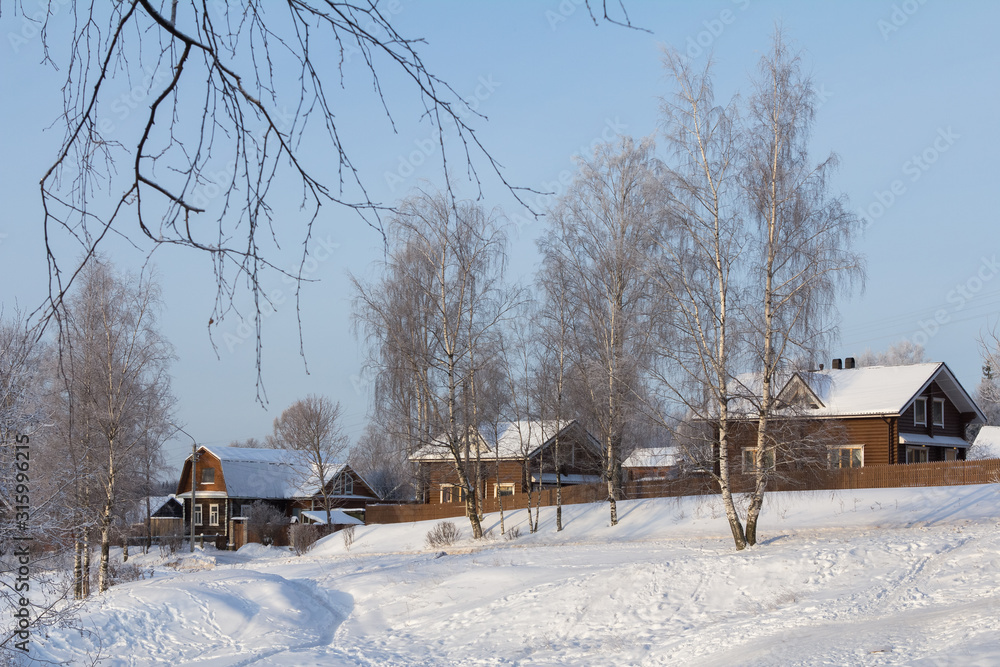 wooden houses on a mountain in winter wooden houses on a mountain in winter