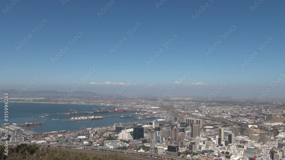 HD high quality sunny day video of spectacular scenic Table Mountain, wide Cape Town city center panorama, Atlantic Ocean bay from Signal Hill view point in Western Cape, Cape Town, South Africa HD high quality sunny day video of spectacular scenic Table Mountain, wide Cape Town city center panorama, Atlantic Ocean bay from Signal Hill view point in Western Cape, Cape Town, South Africa