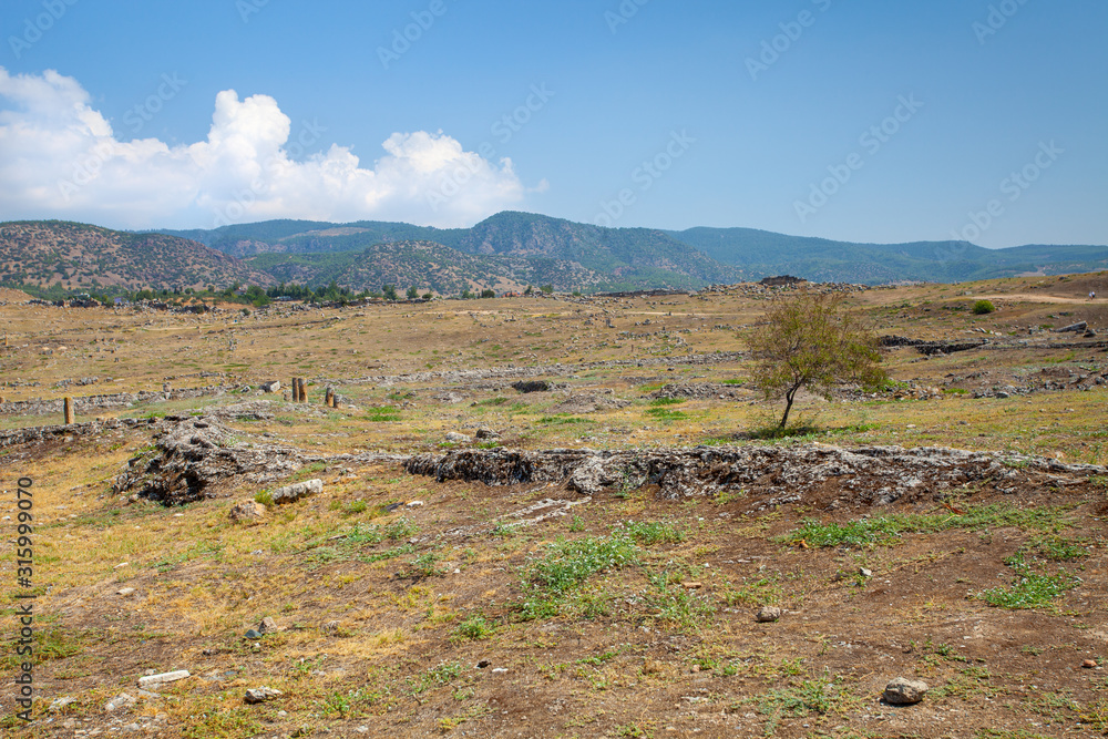 Colorful landscape with the ruins of the ancient city of Hierapolis in Turkey. Colorful landscape with the ruins of the ancient city of Hierapolis in Turkey.