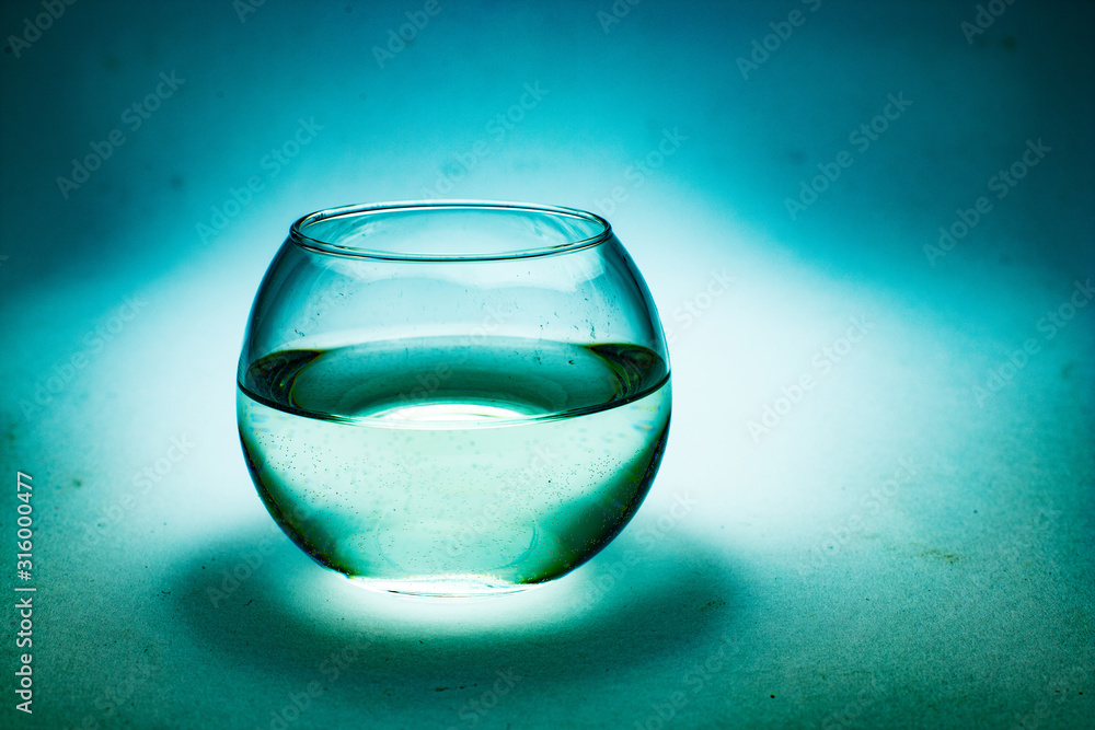 Aquarium with water on grunge background with copy space Aquarium with water on grunge background with copy space