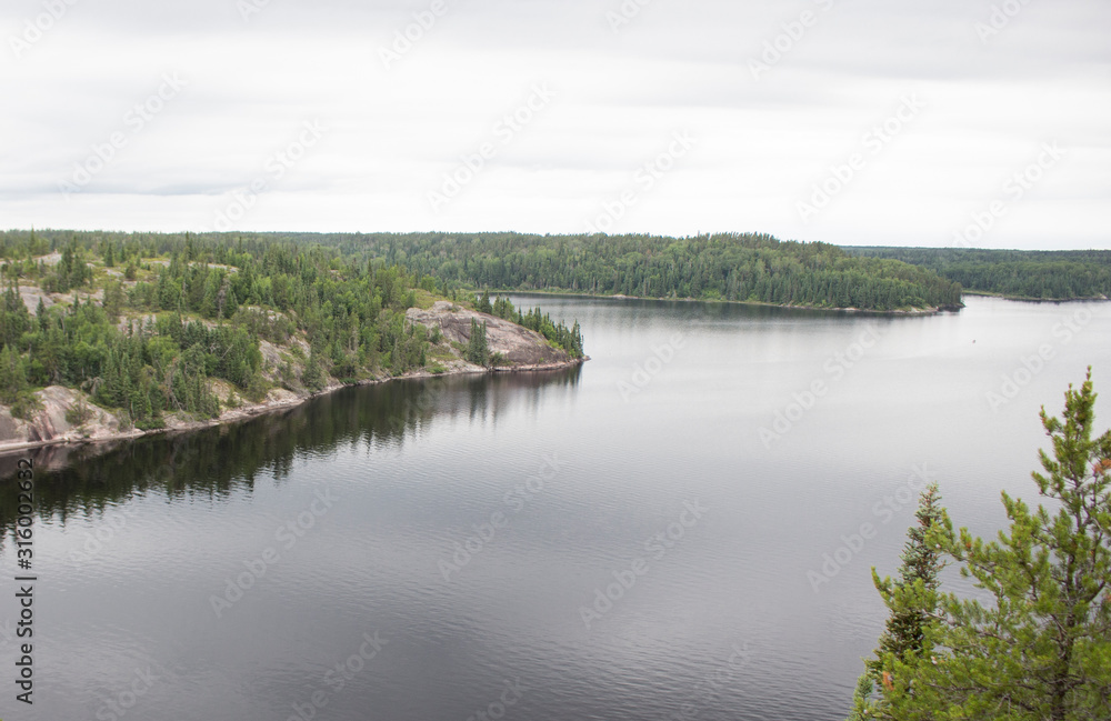Landscape views over the forested lake