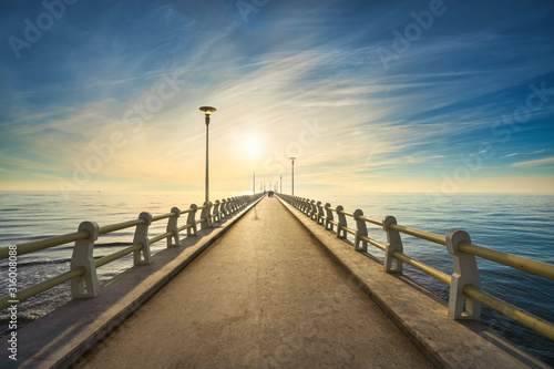 Pier or jetty and sea in Forte dei Marmi at sunset. Versilia Tuscany Italy © stevanzz