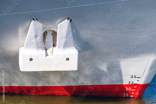 Ship with anchor and draft scale numbering side on waterline