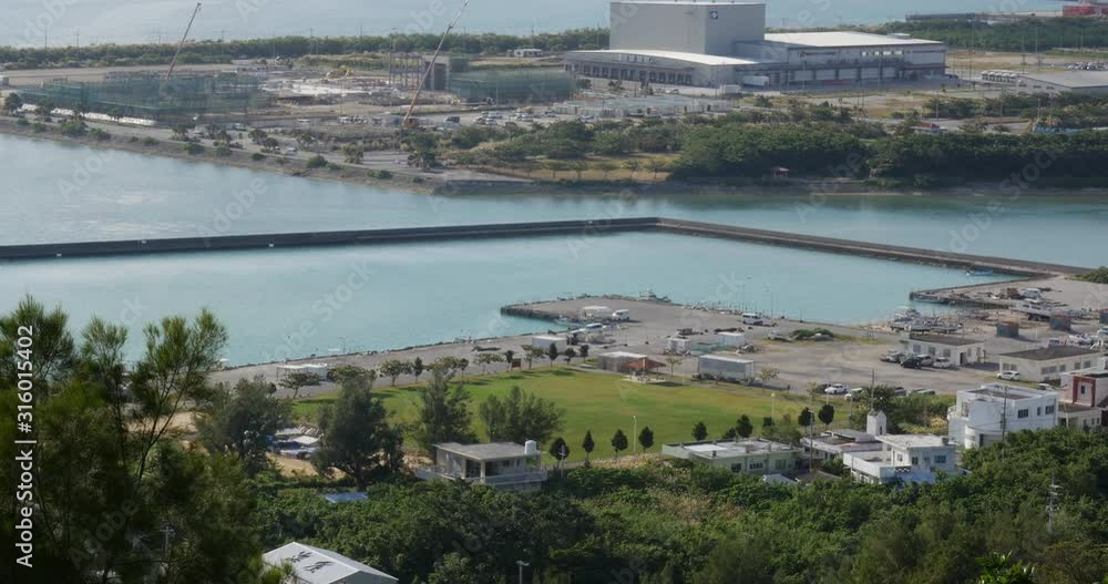 view from Katsuren Castle Okinawa, Japan. 20-1-20 The Naha Port Facility, formerly the Naha Military Port, Japanese facility located in Naha, Okinawa, Japan, at the mouth of Kokuba view from Katsuren Castle Okinawa, Japan. 20-1-20 The Naha Port Facility, formerly the Naha Military Port, Japanese facility located in Naha, Okinawa, Japan, at the mouth of Kokuba