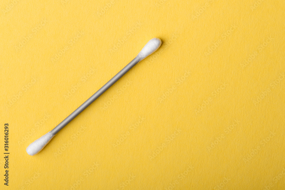 Cotton sticks isolated on yellow background. Ear stick. Cotton sticks isolated on yellow background. Ear stick.