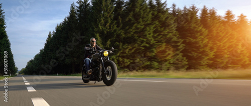 motorbike on the road riding. having fun riding the empty road on a motorcycle tour   journey