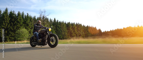 фотографія motorbike on the road riding