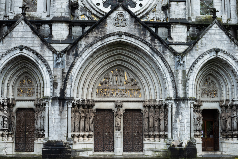 Arched entrance of Saint Fin Barre's Cathedral in Cork city, Ireland