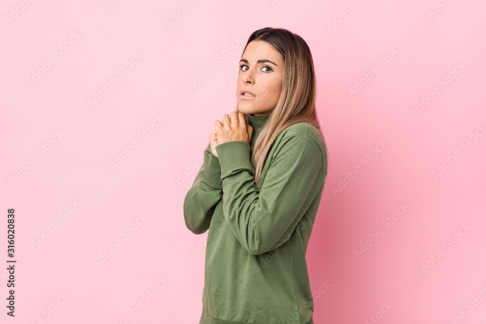 Young caucasian woman isolated scared and afraid. Young caucasian woman isolated scared and afraid.