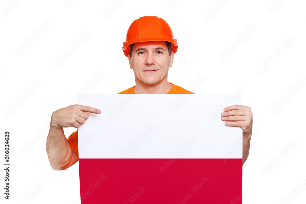 smiling middle-aged worker wearing orange hard hat, holding sheet with polish flag in hands smiling middle-aged worker wearing orange hard hat, holding sheet with polish flag in hands