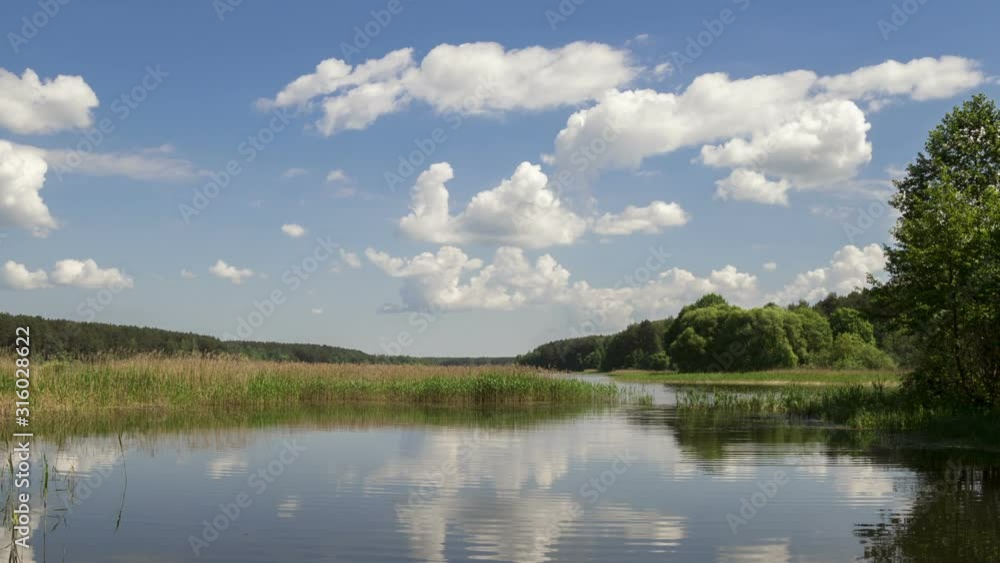 Cumulonimbus clouds over lake, time lapse Cumulonimbus clouds over lake, time lapse